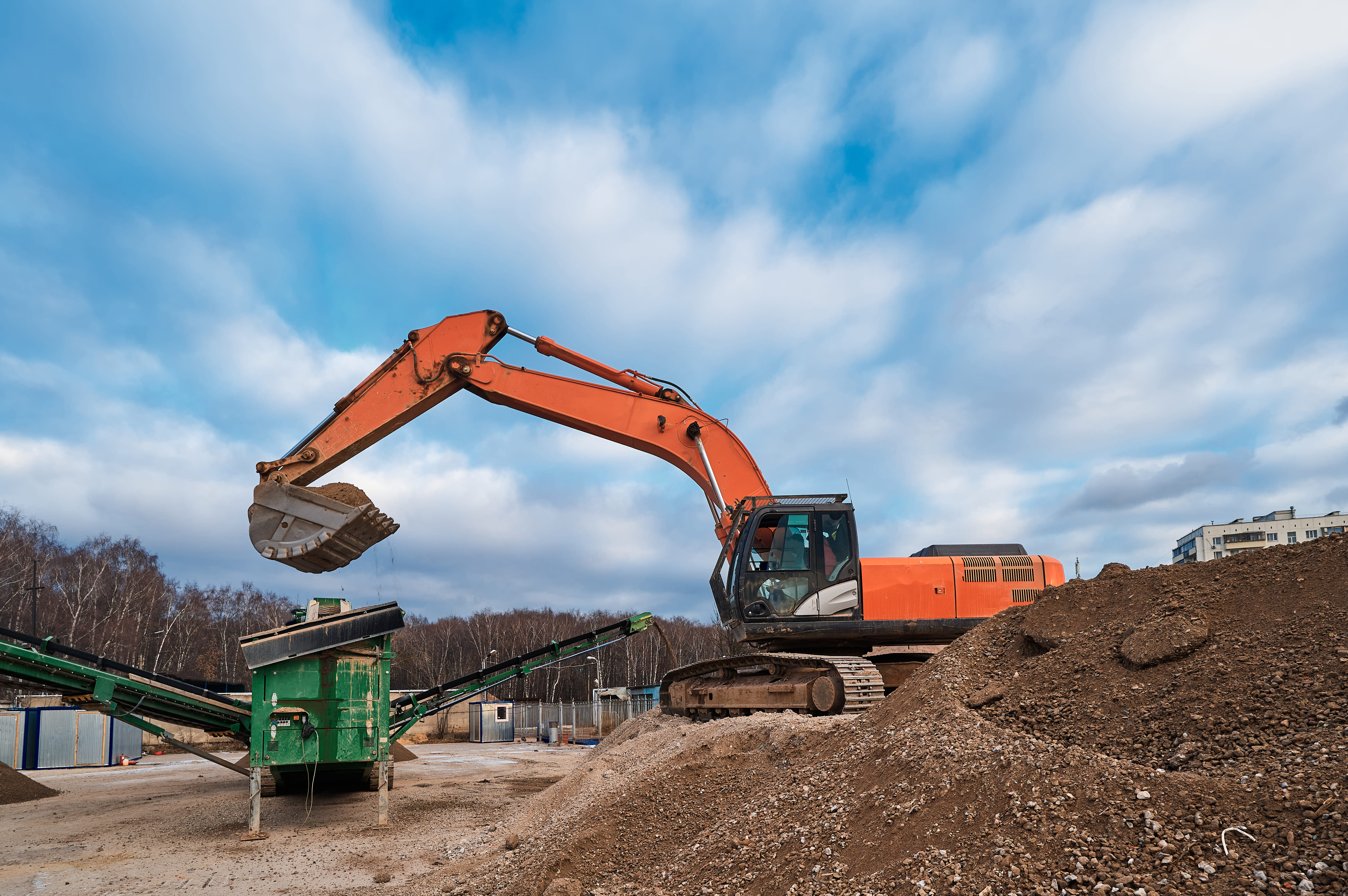 NPD Group excavator at an active construction site
